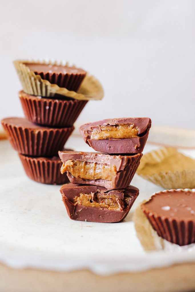 Stack of peanut butter cups with a bite taken out of it